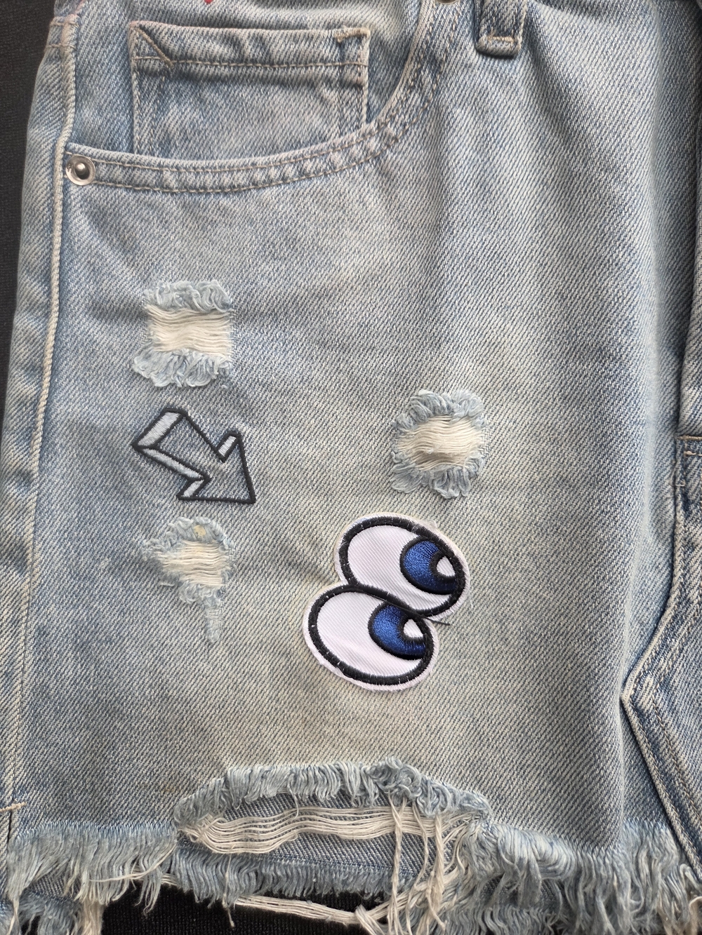 Hidden Jeans Light Wash Distressed Denim Mini Skirt with Fun Patches - Picture 7 of 11
